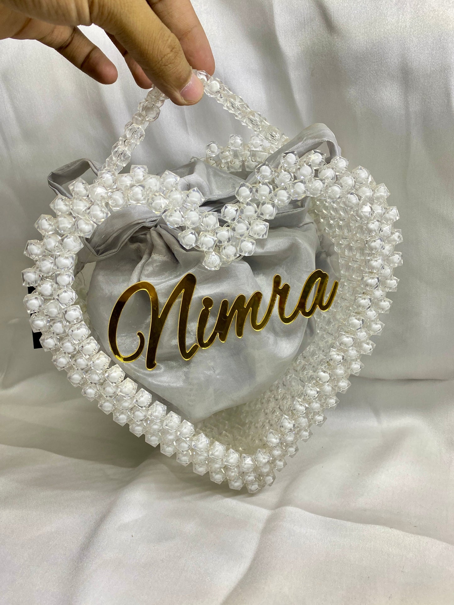 Side view of Ethereal Love clutch – pastel bridal bag with beaded strap