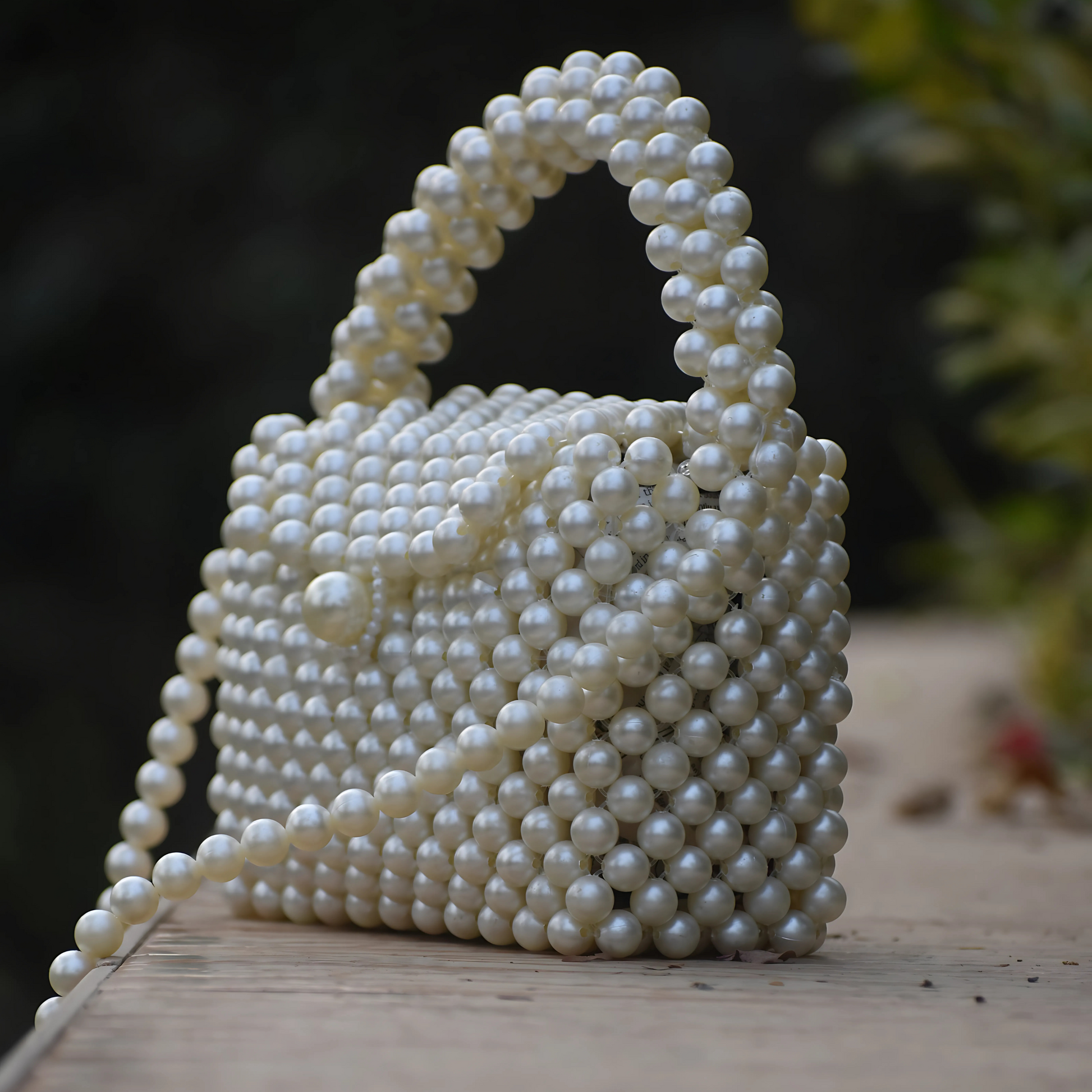 Bridal pearl bag for traditional and modern outfits.