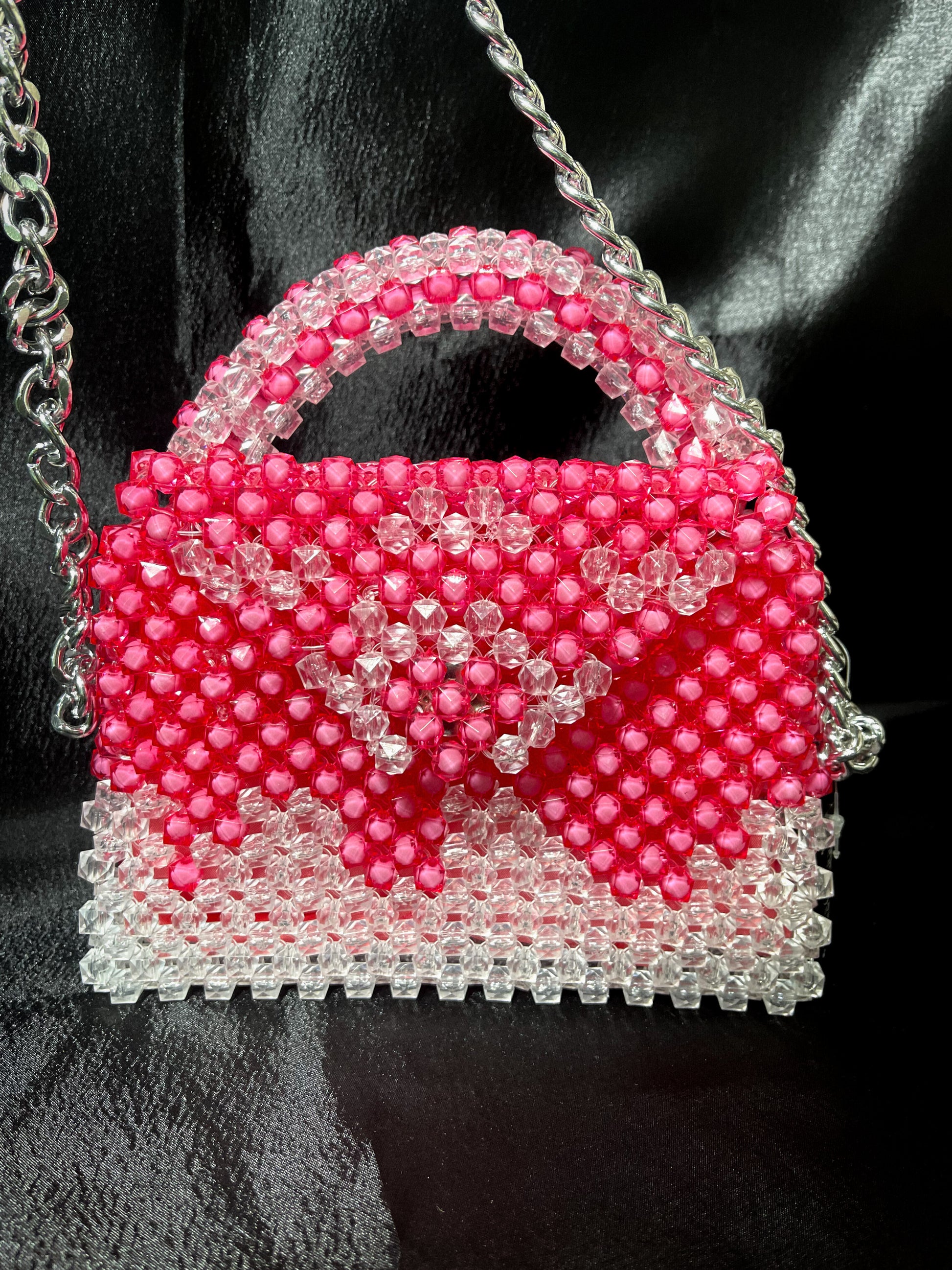 A dazzling handmade plastic crystal handbag designed for a sophisticated and glamorous look