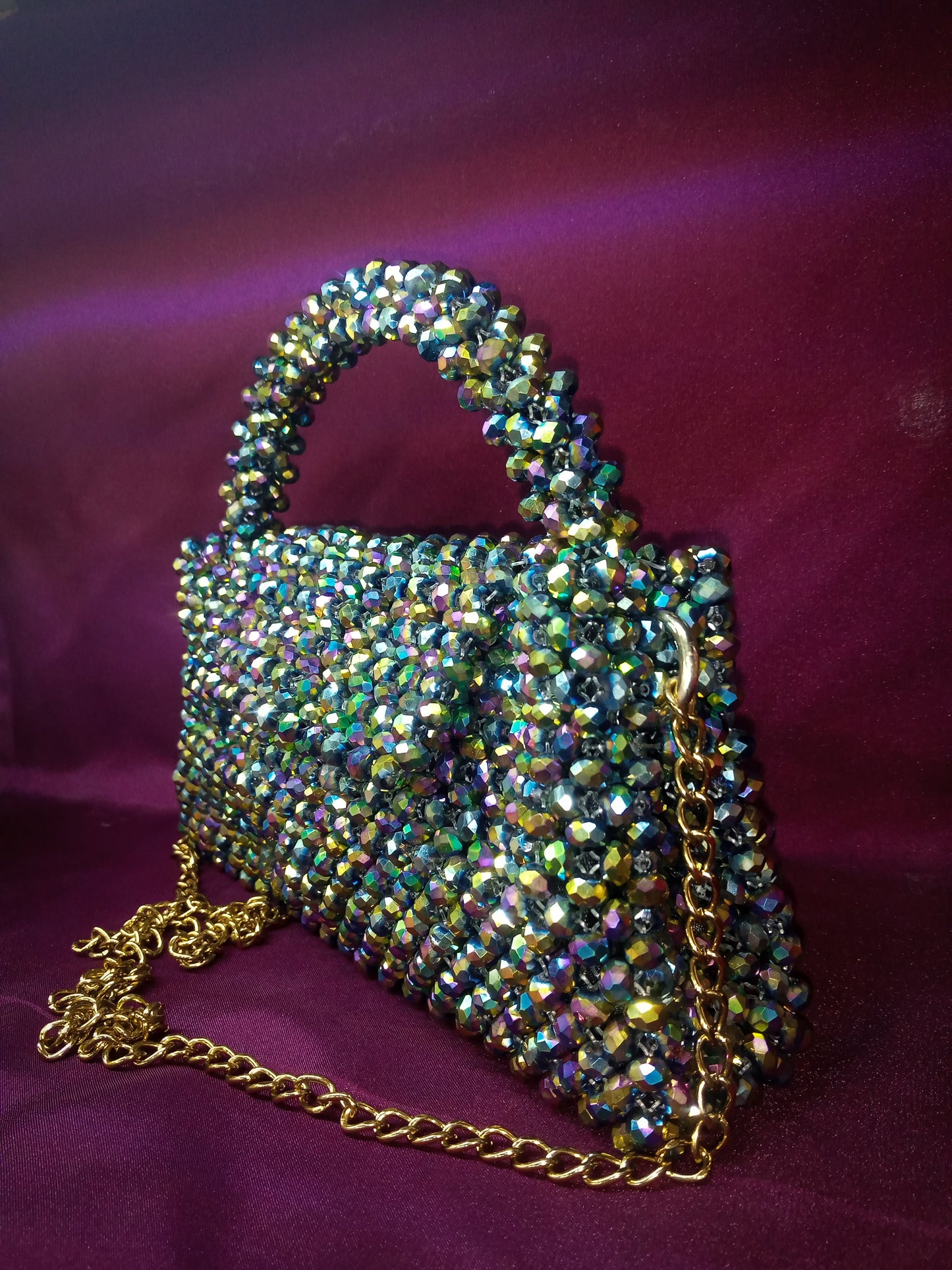 Opulent Glow Bag, a high-end luxury accessory with shining crystals.