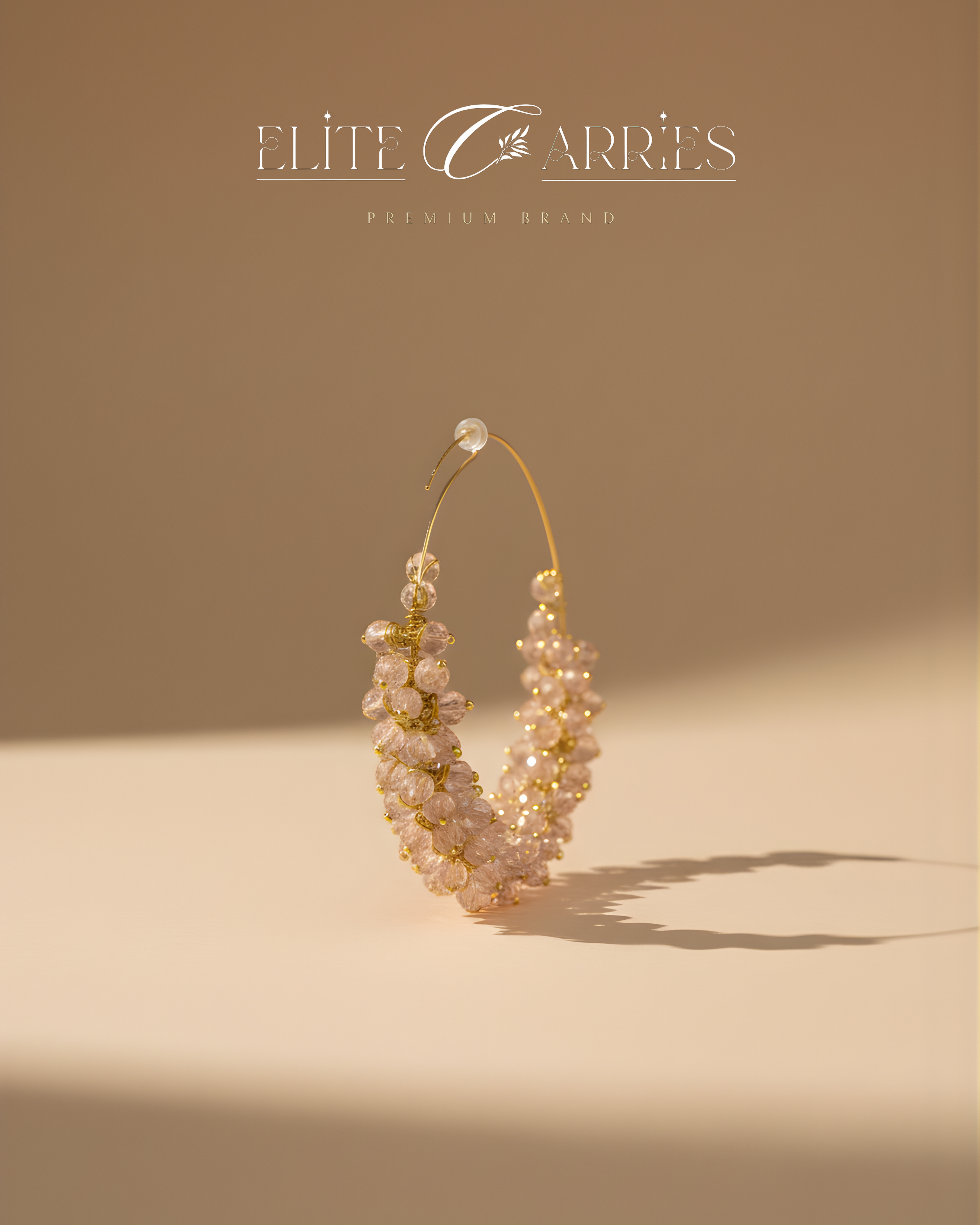 Pearl earring with gold accents on a beige background, featuring the brand 'Elite Carries'.